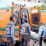 سيارة إسعاف وقوات أمن في موقع حادث بمدينة سوهاج